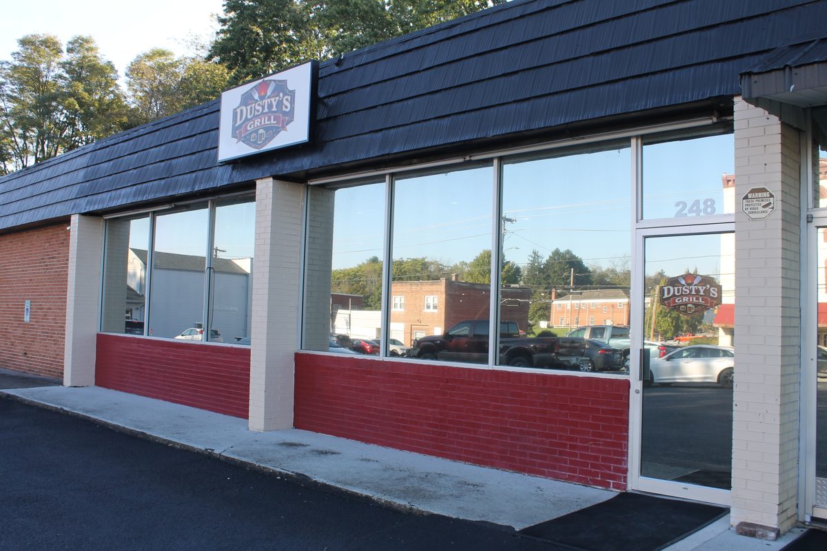 The front of Dusty's Grill at 248 W Main St, with the sign over the windows